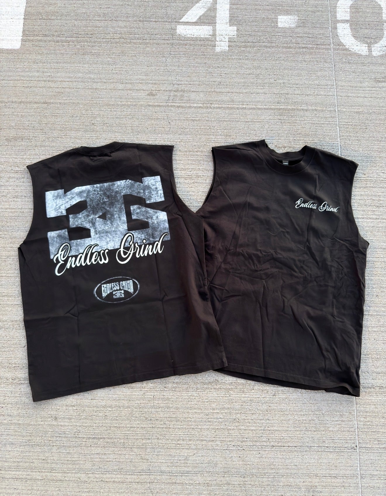 Concrete Sleeveless Tees